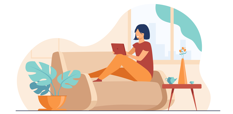 SurveyClub History. Woman on sofa using laptop reading